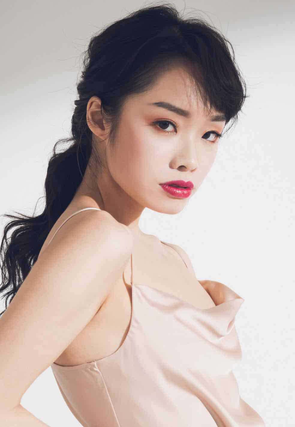 Queenie L